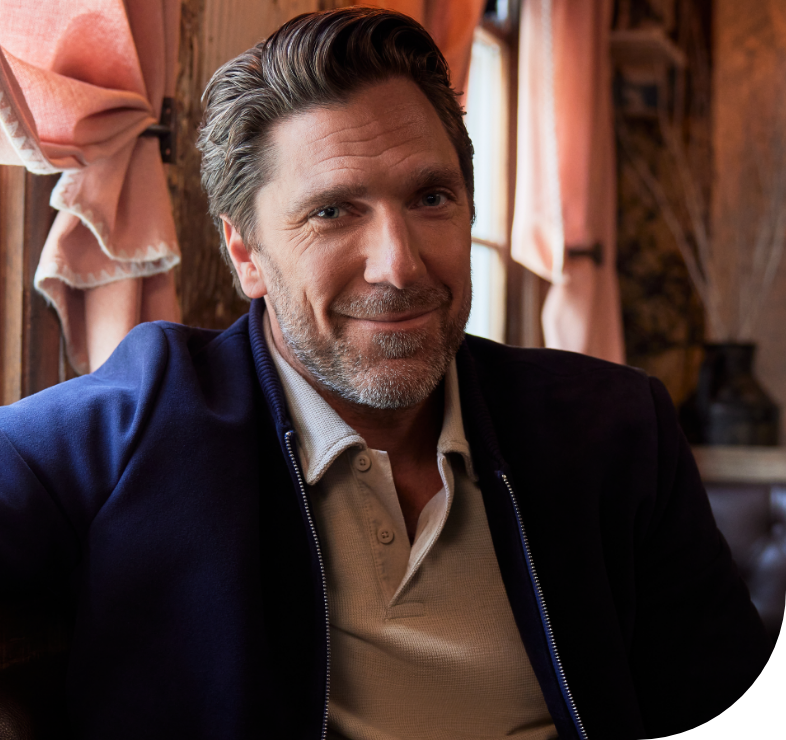 Henrik Lundqvist sitting down and smiling